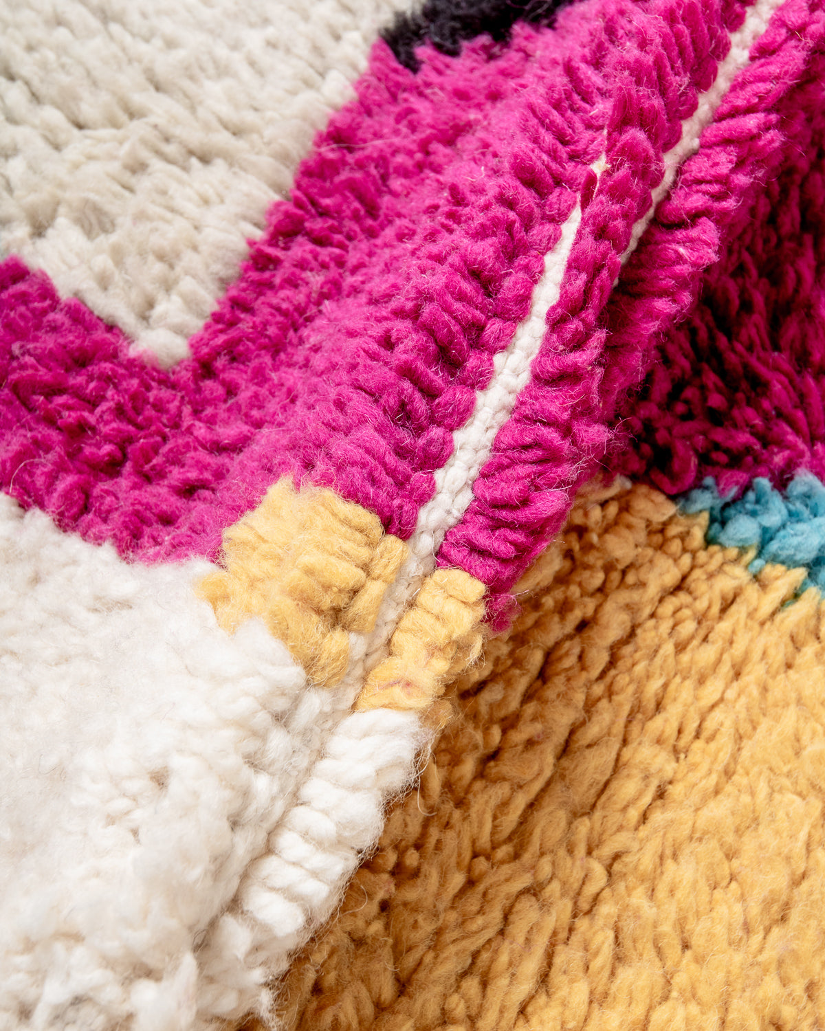 Modern, designer, handcrafted Berber rug from Morocco. Beniourain carpet with beautiful colours and patterns and fluffy wool texture.